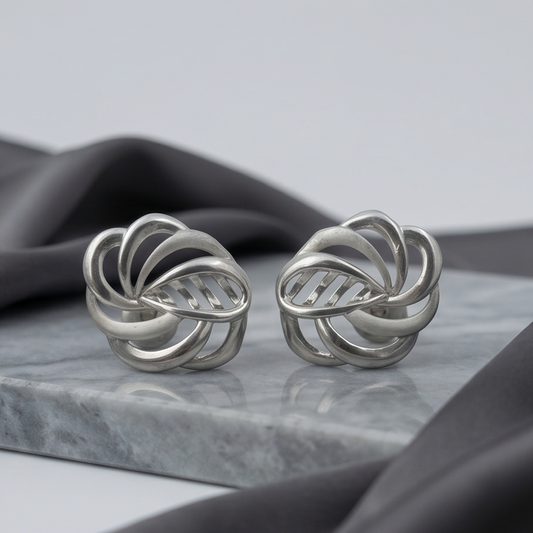 DIVYORO INTERTWINED SILVER STUDS EARRING