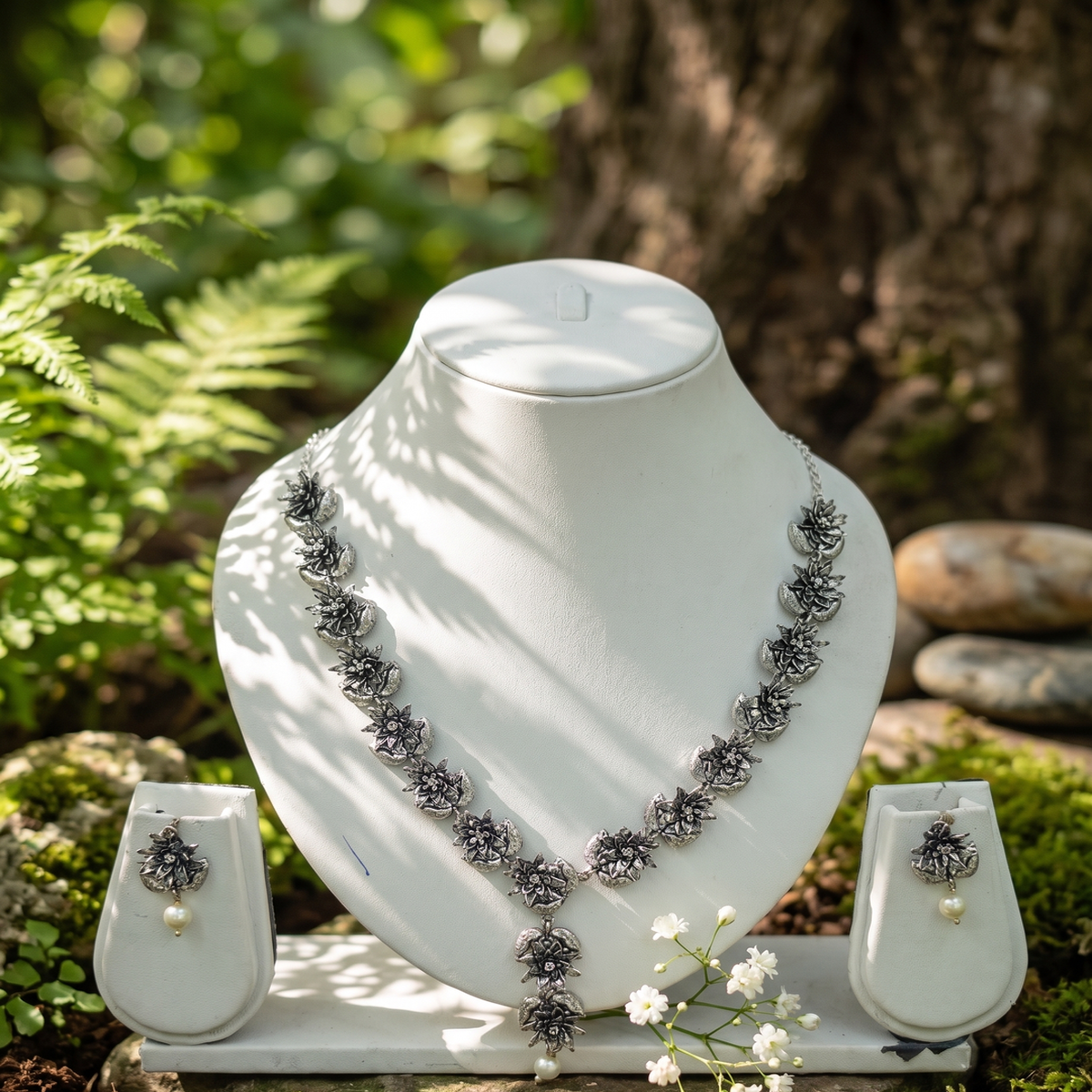 DIVYORO FLORAL CLUSTER OXIDIZED SILVER NECKLACE SET WITH PEARL DROP