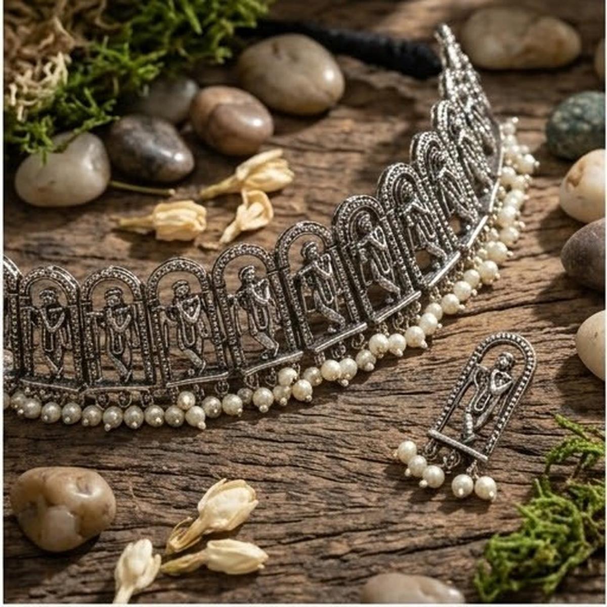 DIVYORO INTRICATE OXIDIZED SILVER KRISHNA MOTIF CHOKER SET