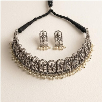DIVYORO INTRICATE OXIDIZED SILVER KRISHNA MOTIF CHOKER SET