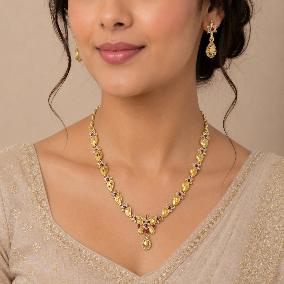 DIVYORO GOLD-PLATED BUTTERFLY MOTIF NECKLACE SET WITH RUBY ACCENTS