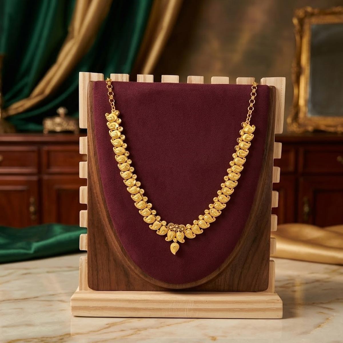 DIVYORO TRADITIONAL GOLD PAISLEY MOTIF NECKLACE