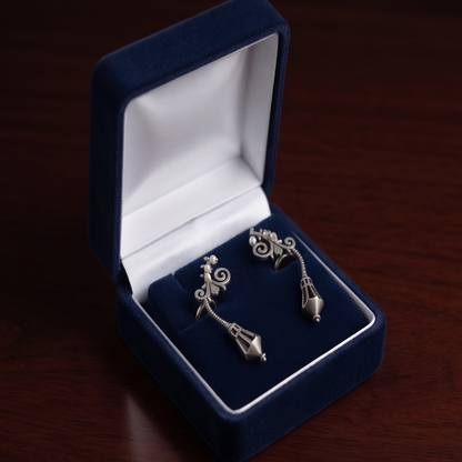DIVYORO ANTIQUE SILVER-TONED STREET LAMP PEARL DANGLING EAR CUFFS