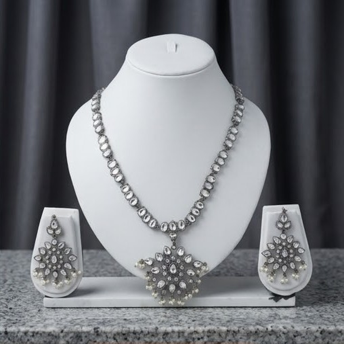 DIVYORO ELEGANT WHITE STONE TEARDROP FLORAL NECKLACE SET