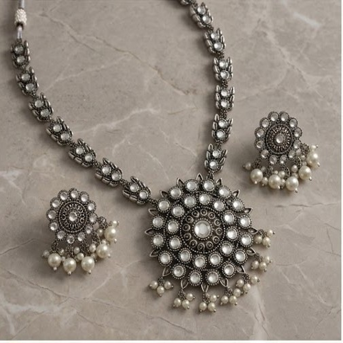 DIVYORO CLASSIC CIRCULAR WHITE STONE MEDALLION NECKLACE SET