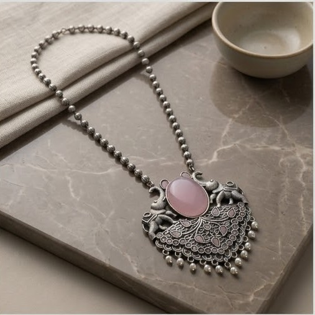 DIVYORO ELEPHANT MOTIF PINK STONE STATEMENT PENDANT NECKLACE