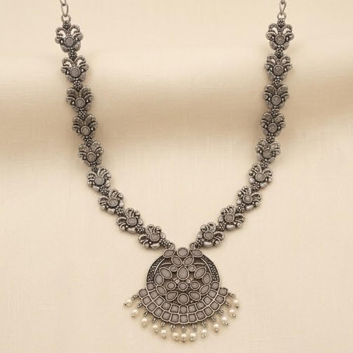 DIVYORO DELICATE OXIDIZED SILVER NECKLACE WITH FLORAL MOTIF AND DROP PENDANT