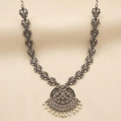 DIVYORO DELICATE OXIDIZED SILVER NECKLACE WITH FLORAL MOTIF AND DROP PENDANT