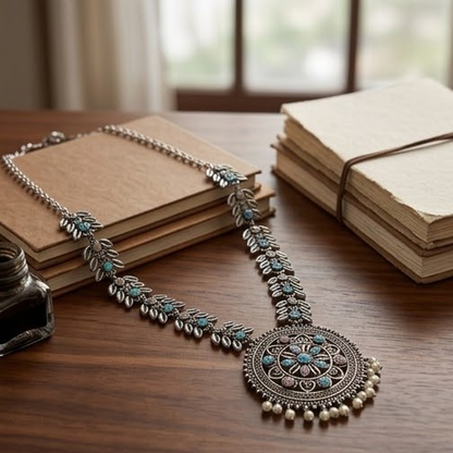 DIVYORO ANTIQUE SILVER FLORAL PENDANT NECKLACE WITH PASTEL STONE ACCENTS