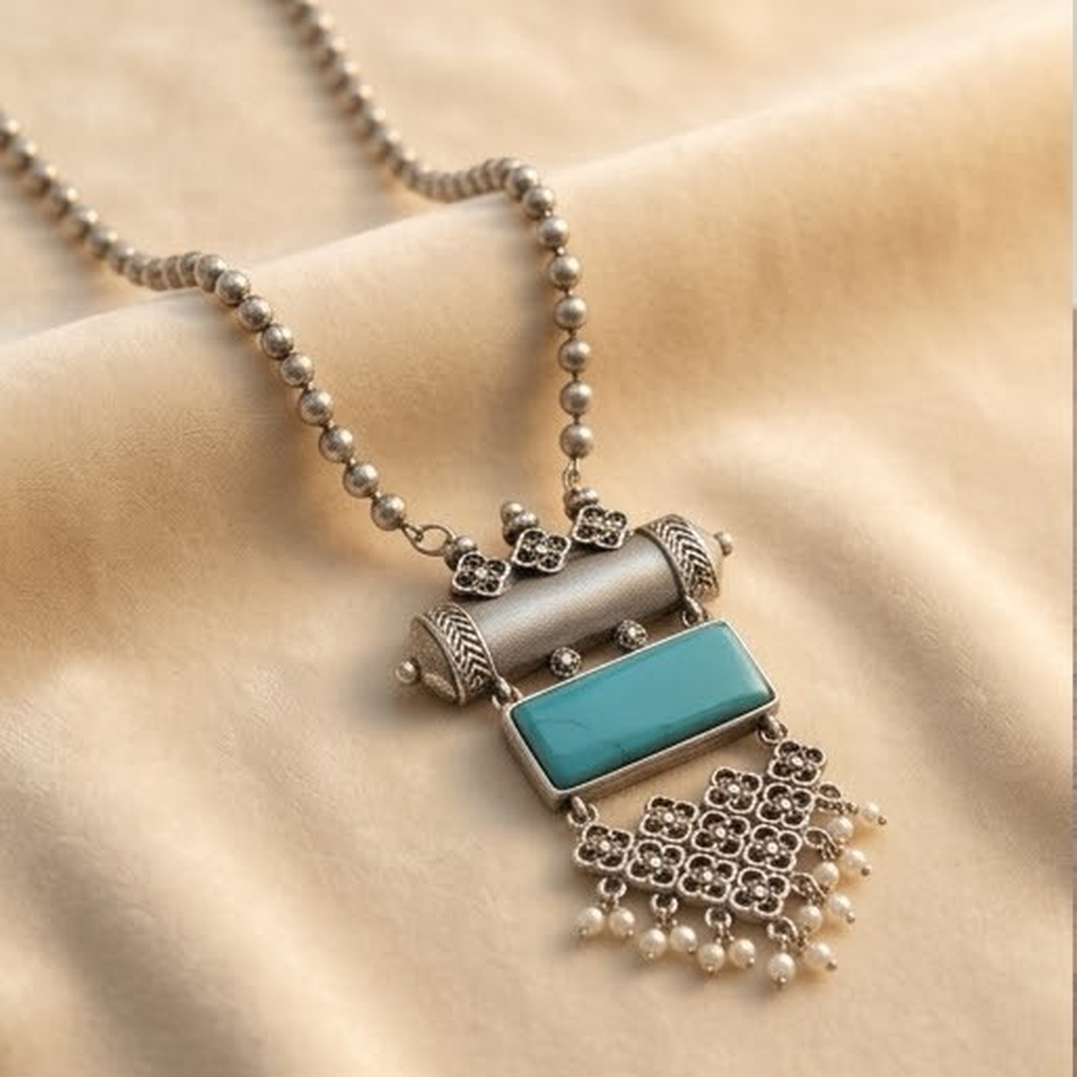 DIVYORO CLASSIC TURQUOISE RECTANGULAR PENDANT OXIDIZED NECKLACE WITH PEARL DETAILING