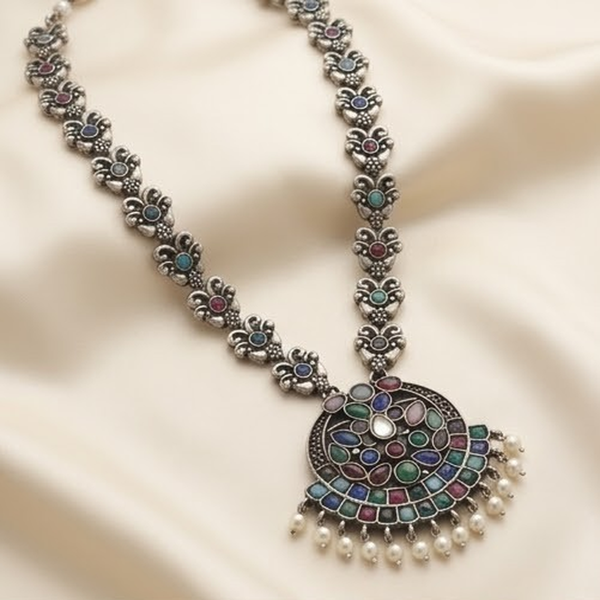 DIVYORO MULTI-COLORED GEMSTONE CIRCULAR PENDANT OXIDIZED SILVER NECKLACE