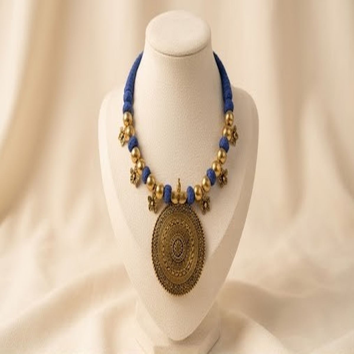 DIVYORO ETHNIC BLUE BEAD AND ANTIQUE GOLD MEDALLION NECKLACE