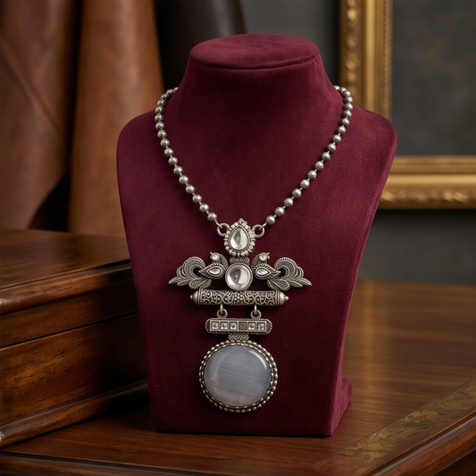 DIVYORO GREY STONE EMBELLISHED PEACOCK MOTIF OXIDIZED NECKLACE