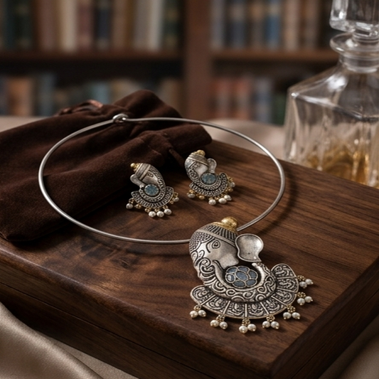 DIVYORO ORNATE GANESHA MOTIF OXIDIZED NECKLACE SET WITH SOFT BLUE STONE