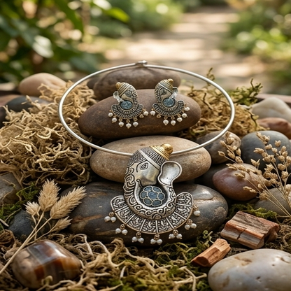 DIVYORO ORNATE GANESHA MOTIF OXIDIZED NECKLACE SET WITH SOFT BLUE STONE