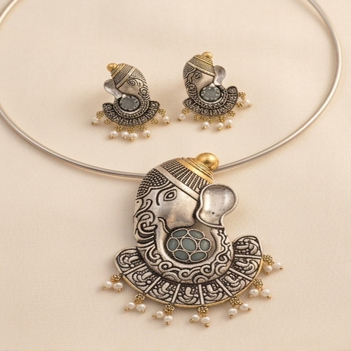 DIVYORO ORNATE GANESHA MOTIF OXIDIZED NECKLACE SET WITH SOFT BLUE STONE