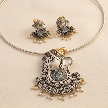 DIVYORO ORNATE GANESHA MOTIF OXIDIZED NECKLACE SET WITH SOFT BLUE STONE