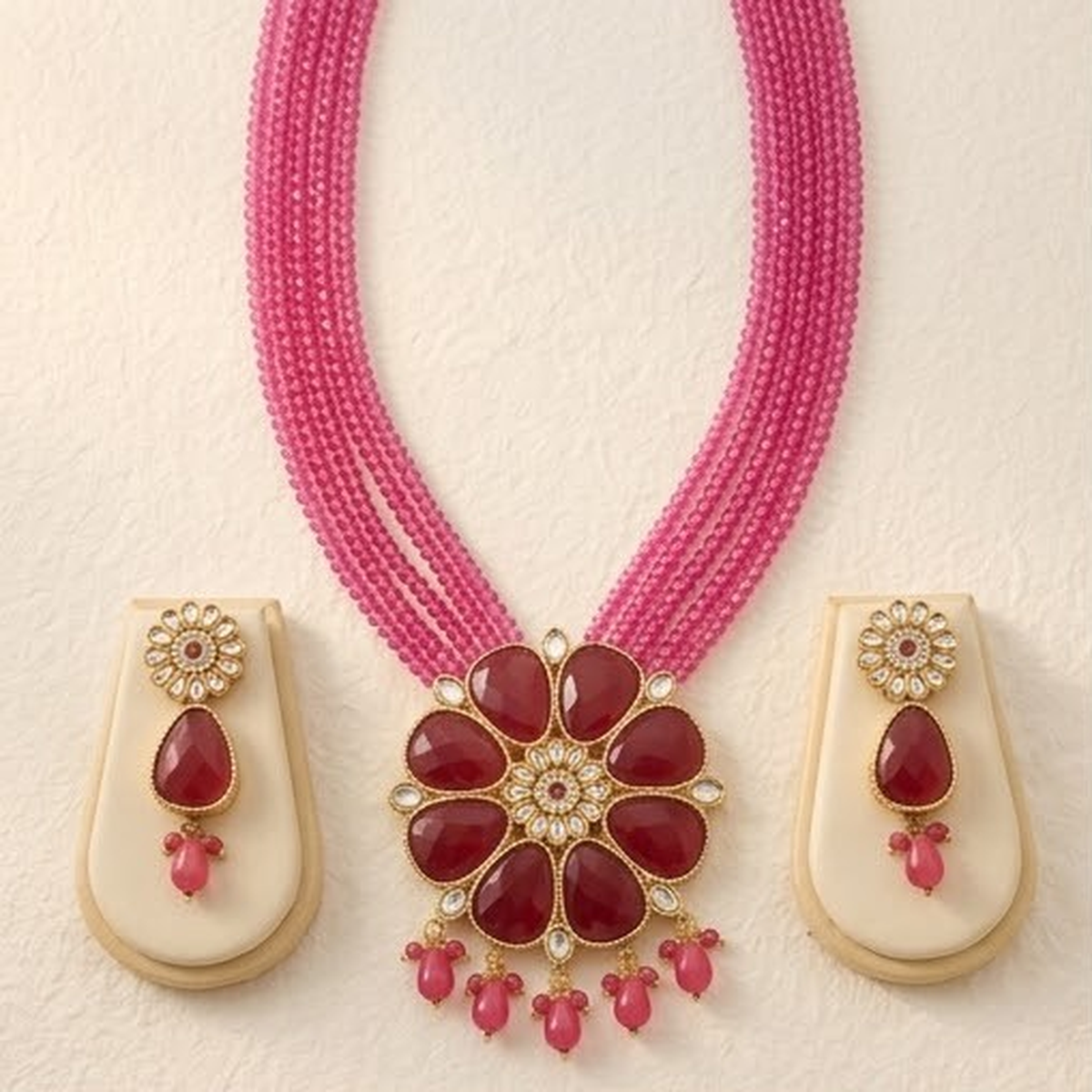 DIVYORO BOLD RUBY FLORAL STATEMENT NECKLACE WITH MULTI-STRAND BEADS
