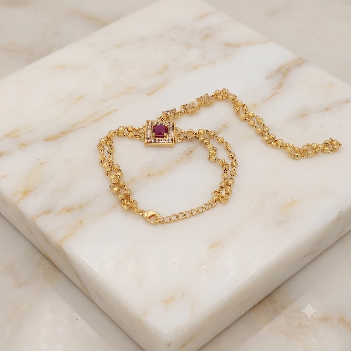 DIVYORO ELEGANT GOLD BRACELET WITH GEMSTONE-STUDDED