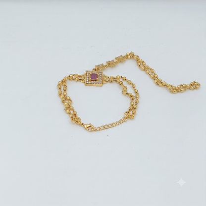 DIVYORO ELEGANT GOLD BRACELET WITH GEMSTONE-STUDDED