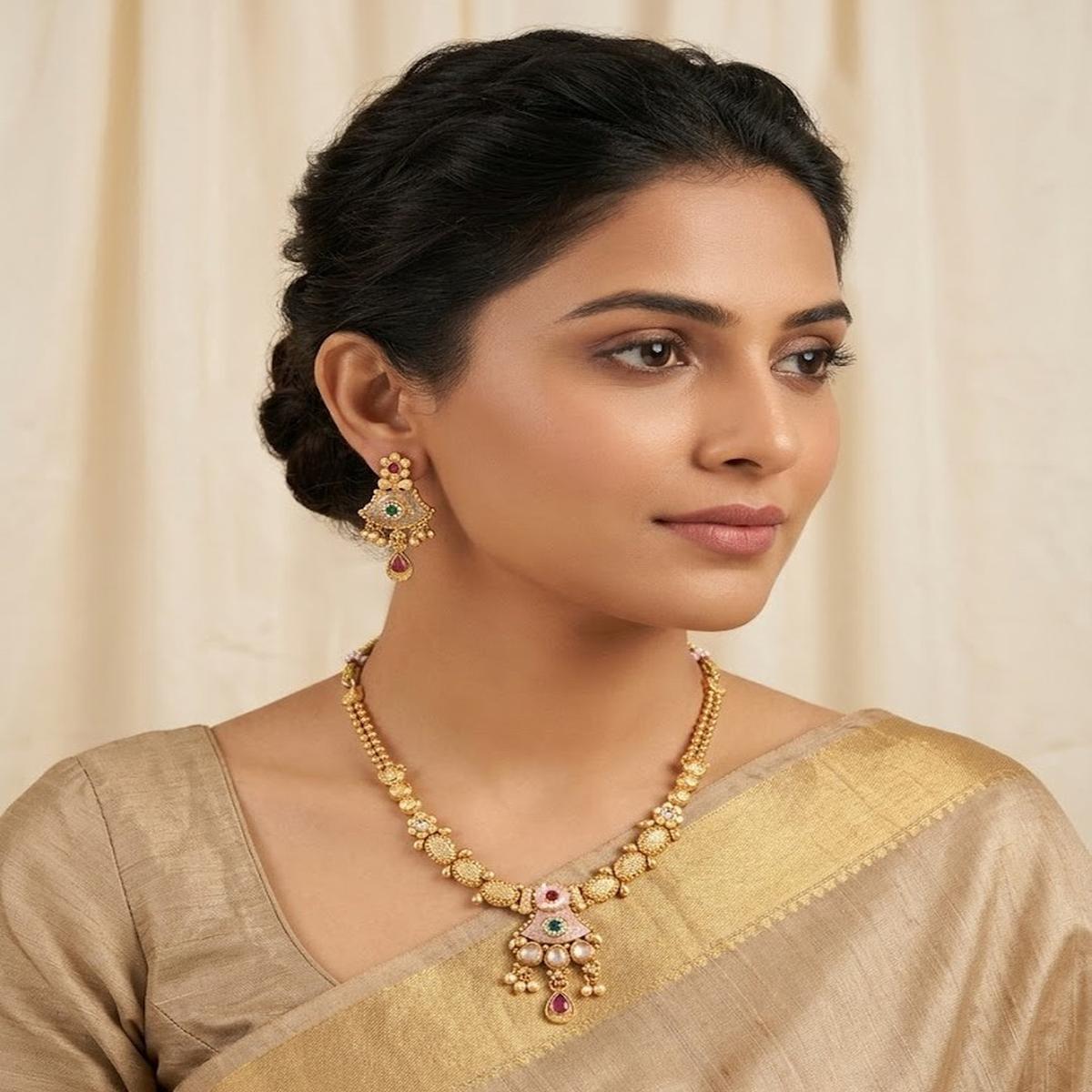 DIVYORO TRADITIONAL ANTIQUE GOLD NECKLACE SET WITH RUBY AND EMERALD ACCENTS