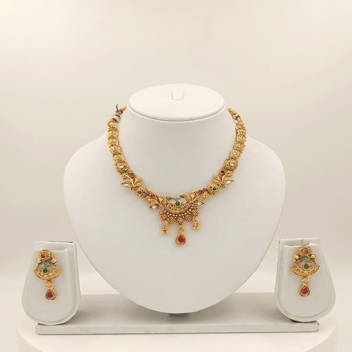 DIVYORO ELEGANT ANTIQUE GOLD NECKLACE AND EARRING SET WITH INTRICATE DROPS
