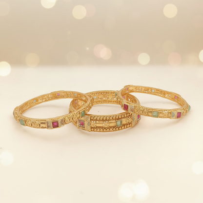 DIVYORO DETAILED ANTIQUE GOLD BANGLE SET WITH MULTI-COLORED STONE SETTINGS