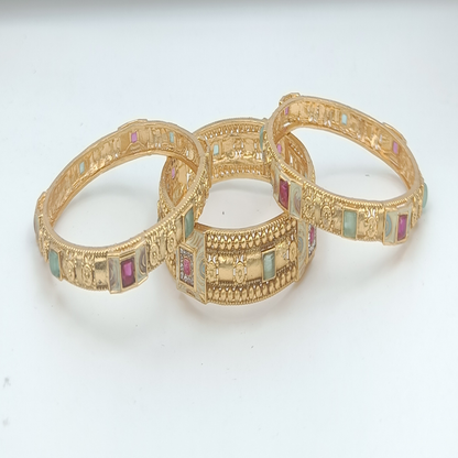 DIVYORO DETAILED ANTIQUE GOLD BANGLE SET WITH MULTI-COLORED STONE SETTINGS