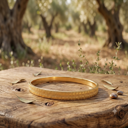 DIVYORO MODERN GOLD KADA WITH REPEATING TEXTURED GRID DETAIL