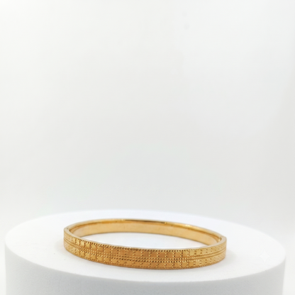 DIVYORO MODERN GOLD KADA WITH REPEATING TEXTURED GRID DETAIL