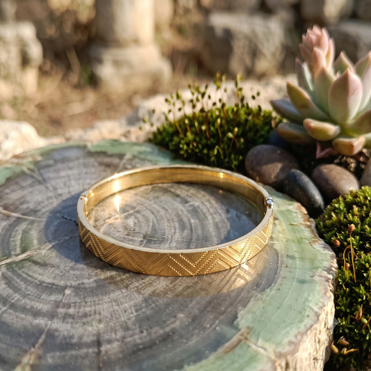 DIVYORO SOPHISTICATED GOLD KADA WITH SUBTLE CHEVRON TEXTURING