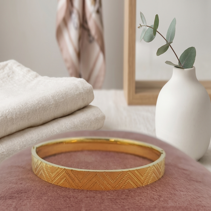DIVYORO SOPHISTICATED GOLD KADA WITH SUBTLE CHEVRON TEXTURING
