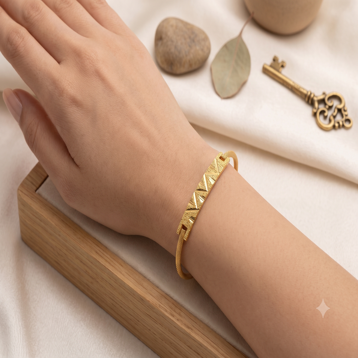 DIVYORO MINIMALIST TEXTURED GOLD KADA WITH GEOMETRIC CENTERPIECE