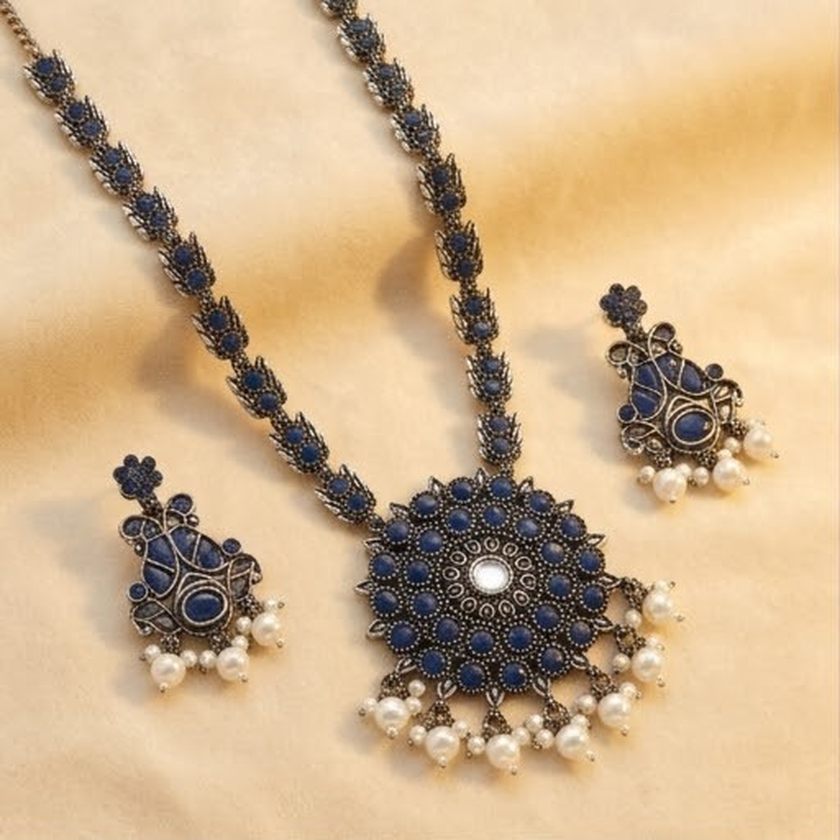 DIVYORO ROYAL BLUE FLORAL MOTIF OXIDIZED SILVER NECKLACE AND EARRING SET