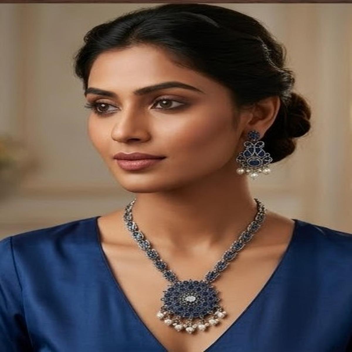 DIVYORO ROYAL BLUE FLORAL MOTIF OXIDIZED SILVER NECKLACE AND EARRING SET
