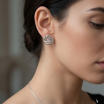 DIVYORO INTERTWINED SILVER STUDS EARRING
