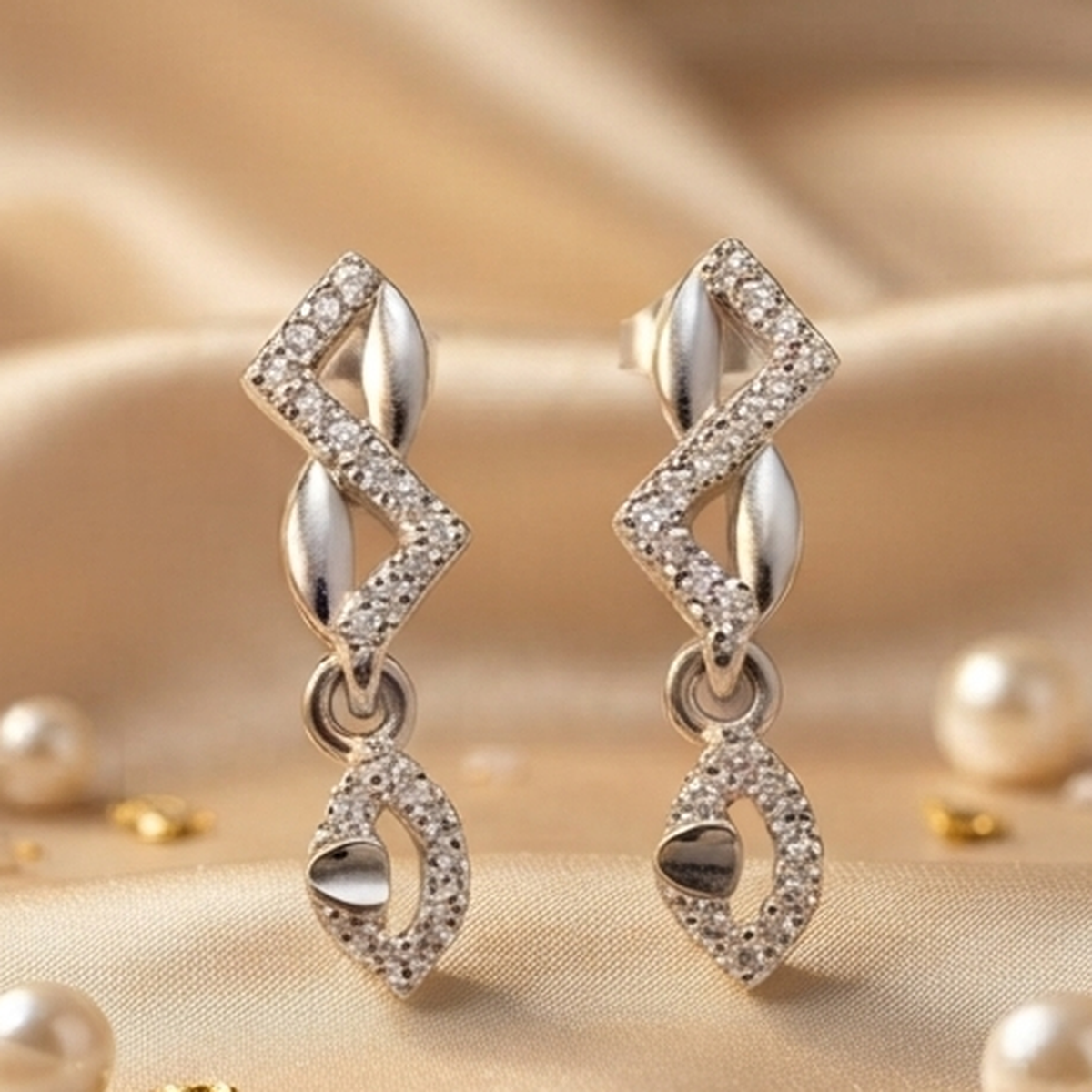 DIVYORO PAVÉ ZIGZAG AND LEAF DROP STUDS EARRING