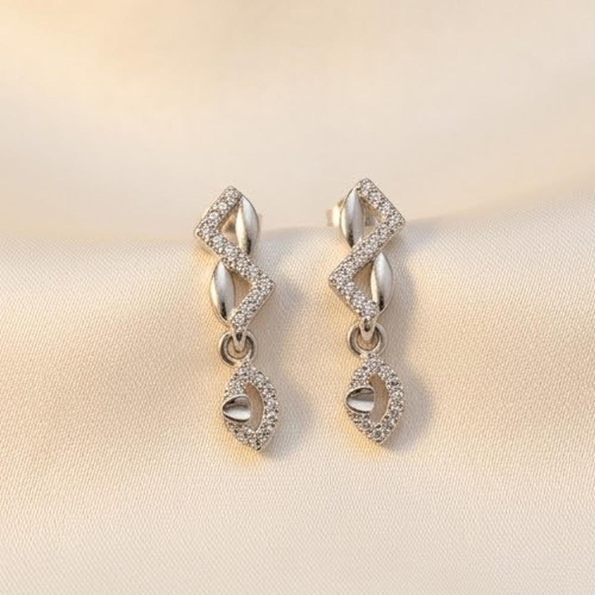 DIVYORO PAVÉ ZIGZAG AND LEAF DROP STUDS EARRING