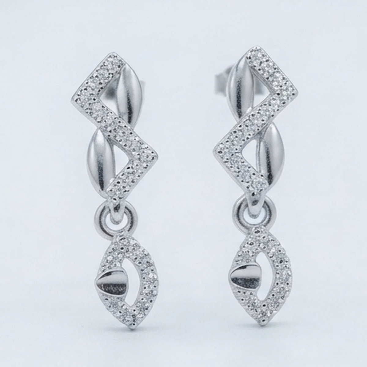 DIVYORO PAVÉ ZIGZAG AND LEAF DROP STUDS EARRING