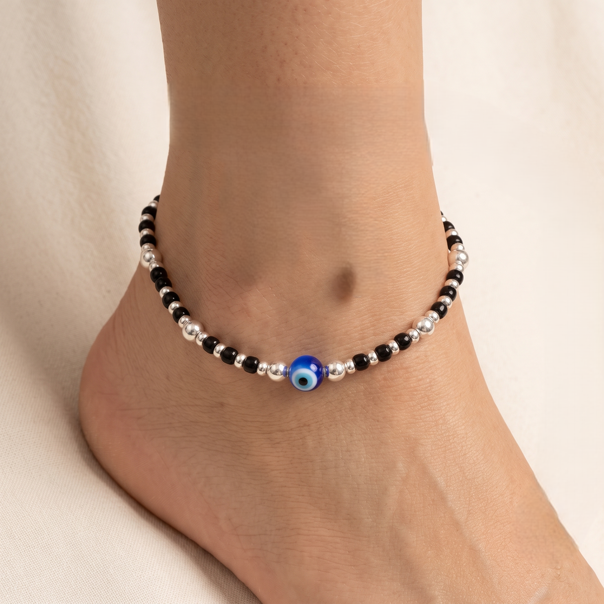 DIVYORO NAZARIYA BLUE EYE SILVER ANKLET